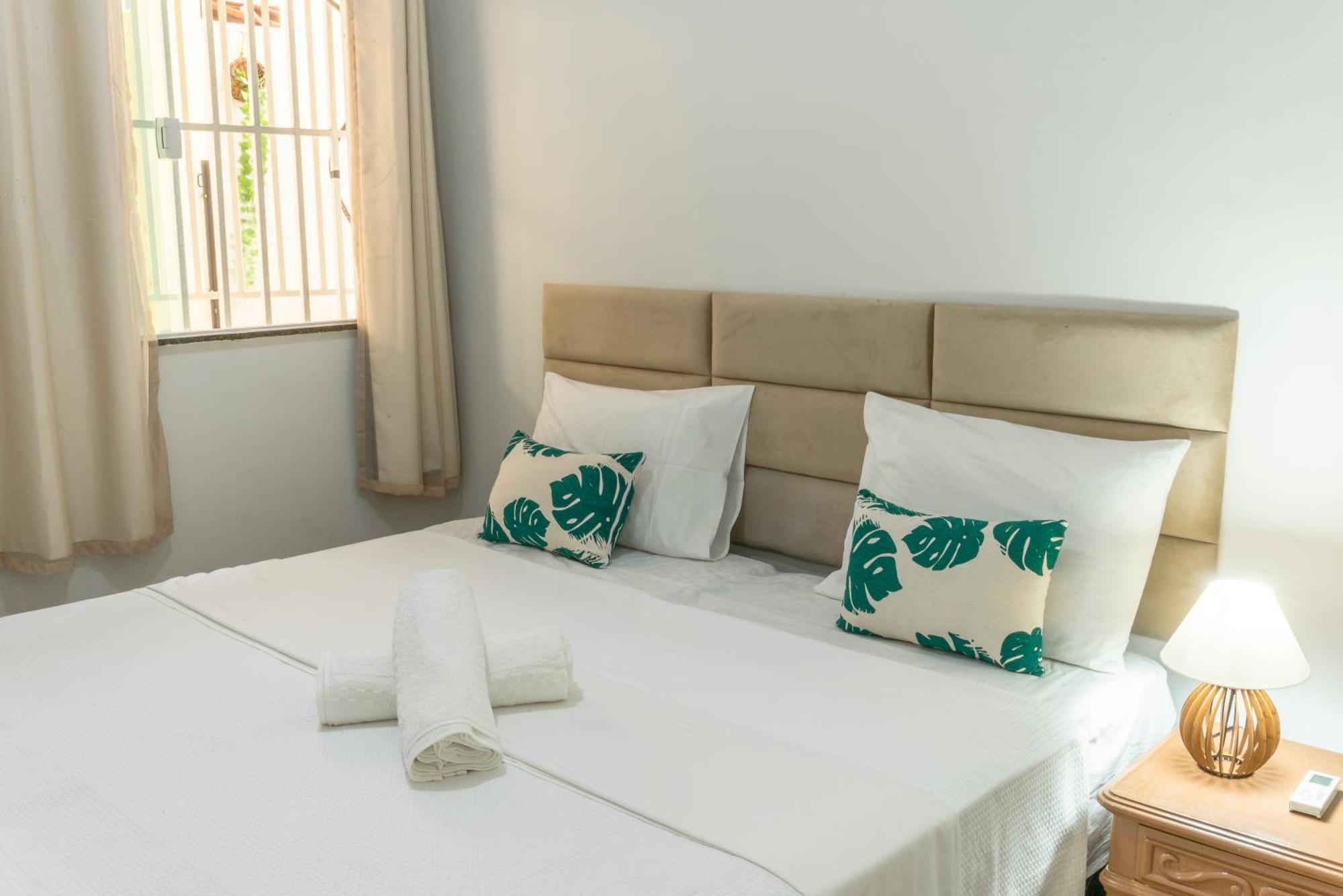 Casa de férias 500M Praia Taperapuan; 2 Quartos; Wifi 300Mbs; Churrasqueira; Chuveirao; Estacionamento Gratuito 1 Carro. *